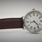 Silver base metal  fashion watch with large numbers and brown strap